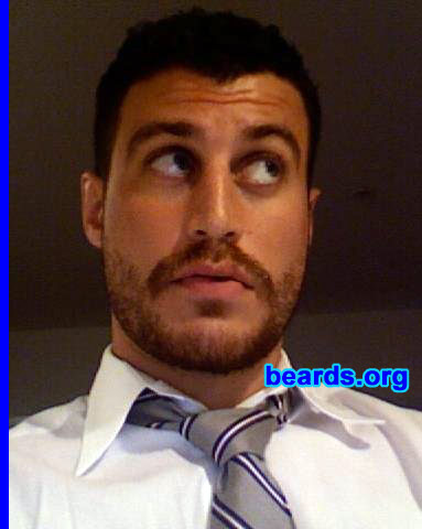 Adam
Bearded since: 2009.  I am an experimental beard grower.

Comments:
I recently moved to California after two years of working in New York's financial district. I quickly noticed that the finance guys out west were much more lax in their stance on shaving. For about the past year since coming out here, I was shaving on Monday mornings only and getting gradually scruffier throughout the week. One Monday morning in late August, I decided that routine was over. I was going to boldly grow where I had never grown before. From the time I was able to grow facial hair 'til now, I had never really gone more than two weeks. I never really thought I had enough thickness in my facial hair to pull it off. I have learned that while my cheeks and jawline aren't quite as thick as I'd like, I can grow a mean 'stache and chin beard and I don't think the contrast looks half bad.

How do I feel about my beard? It's still kind of new, but I absolutely love it. Reactions across the board have been very positive. I don't know that I will keep it forever, but I intend to keep it for at least six months and may become a seasonal beard grower for life. I must say that after about three weeks, I was ready to give up but this site gave me the inspiration to push on and stay BEARDSTRONG!
Keywords: full_beard