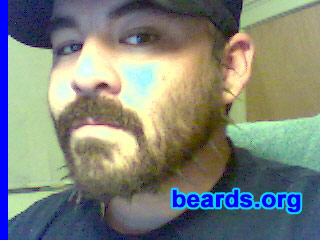 Cesar G.
Bearded since: 2007.  I am an occasional or seasonal beard grower.

Comments:
I grew my beard because of a stupid New Year's resolution that, by two months, was starting to drive me crazy.

How do I feel about my beard?  After two months, it was driving me nuts and it was still too short to start braiding.   So one night, I had some mustache wax and was really bored. The outcome was a spiked beard.  The [url=http://www.beards.org/images/displayimage.php?pos=-2342]first photo[/url] was the first outcome.  After a while, I turned it into a jaw strap with goatee, continuing the spiking.   The way I get it to hold is to form it with mustache wax by grabbing some hair and twisting it.  Then to, get a tight clean spike, I repeat the process with a dab of hair glue.  The finished product is a tight, hard spike that holds all day.  Since these photos were taken, I also spike the patch under my lip.  The kryptonite for this beard is sweat and getting wet.
Keywords: full_beard
