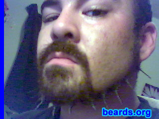 Cesar G.
Bearded since: 2007.  I am an occasional or seasonal beard grower.

Comments:
I grew my beard because of a stupid New Year's resolution that, by two months, was starting to drive me crazy.

How do I feel about my beard?  After two months, it was driving me nuts and it was still too short to start braiding.   So one night, I had some mustache wax and was really bored. The outcome was a spiked beard.  The [url=http://www.beards.org/images/displayimage.php?pos=-2342]first photo[/url] was the first outcome.  After a while, I turned it into a jaw strap with goatee, continuing the spiking.   The way I get it to hold is to form it with mustache wax by grabbing some hair and twisting it.  Then to, get a tight clean spike, I repeat the process with a dab of hair glue.  The finished product is a tight, hard spike that holds all day.  Since these photos were taken, I also spike the patch under my lip.  The kryptonite for this beard is sweat and getting wet.
Keywords: full_beard