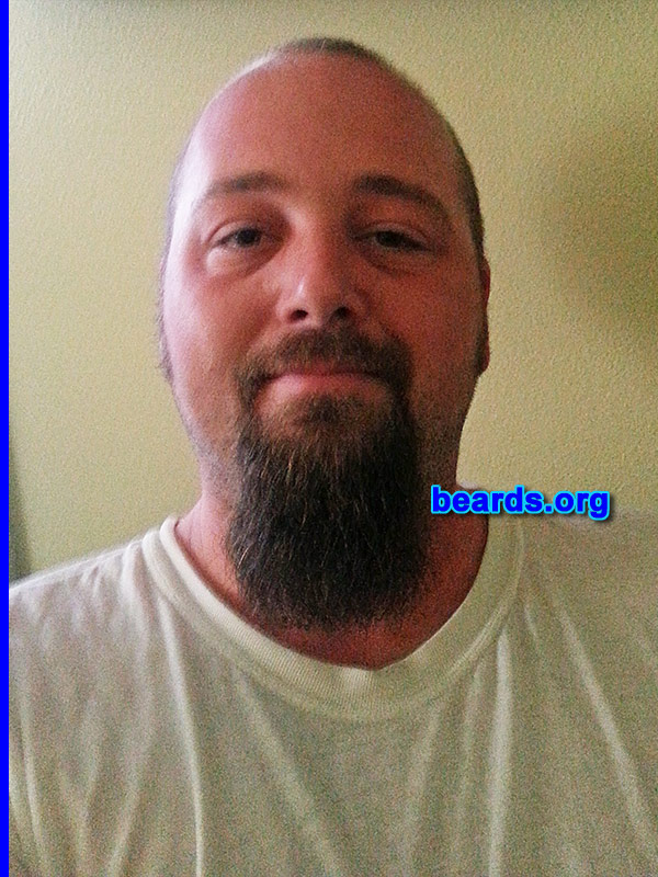 Clint
Bearded since: 2005. I am a dedicated, permanent beard grower.

Comments:
Why did I grow my beard? I've tried many different styles over the years that I've been able to grow one. Every time I shave cleanly, I hate it. A man should have a beard. It shows confidence and strength.

How do I feel about my beard? My beard is not where I want it to be yet. I'm going for a pretty long goatee. I keep the mustache area trimmed back around my mouth simply because it's a pain when I eat. This is only about eight-to-nine months of growth since it comes in really fast. I'm pretty pleased with the overall look, though.
Keywords: goatee_mustache