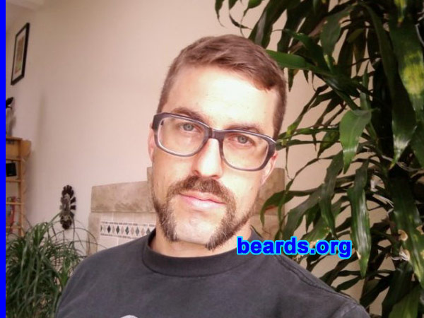 Dean
Bearded since: 2003.  I am a dedicated, permanent beard grower.

Comments:
I grew my beard for maturity.

How do I feel about my beard?  I love it; I'll never be clean shaven again.
Keywords: mutton_chops