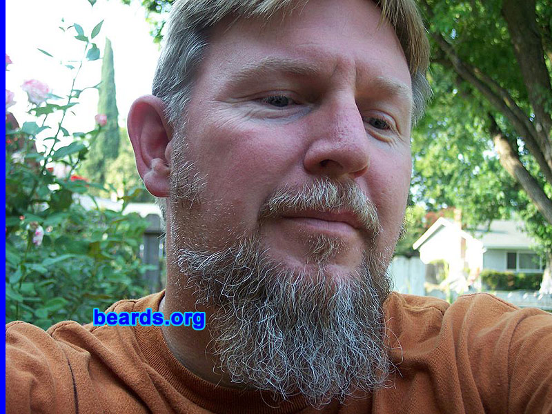 Dennis S.
Bearded since: 1986.  I am a dedicated, permanent beard grower.

Comments:
I grew my beard to look older.

How do I feel about my beard?  I love it...love to tug it.
Keywords: goatee_mustache