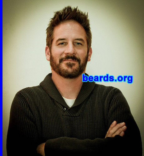 David
Bearded since: February 2012. I am an experimental beard grower.

Comments:
I grew my beard because I wanted to do something different. I've made a few feeble attempts at growing a beard over my lifetime. I could never commit due to itching, or the women in my life could not tolerate being close, complaining about being too prickly.

Also, doing some genealogy research, I found that many of my great grandfathers sported a nice manly beard. Somehow, I thought I may be honoring their memory by growing a beard.

How do I feel about my beard? My beard grows straight, sort of porcupine style. I was hoping that the longer it grew, it would start to fill in a bit more. It filled in but doesn't really lie down like I'd imagined.

But aside from that, I really like my beard. I think it frames my face a little better. It also takes a little focus off of my slightly receding hair line. Outside of my own family (wife and daughters), I've received many compliments. Much more than I ever did when I wore a goatee.

I'll admit that the beard has increased my self confidence. I feel like I carry myself in a more manly manner, but not as far as feeling like a lumberjack.
Keywords: full_beard