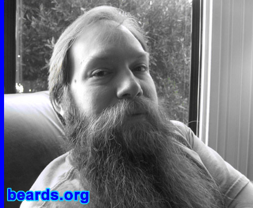 George Gaspar
Bearded since: 2007.  I am an experimental beard grower.

Comments:
I grew this beard to see how long it would get. It's been about seventeen months and it keeps going so I'll keep going. Now I'm going to Alaska for the World Beard and Moustache Championships!

How do I feel about my beard? I love having a beard or some facial hair of some sort. Even if I don't have a full beard I'm always growing something on my face. I've never had a mustache this long, and sometimes it gets in the way, but other than that I love a full beard!
Keywords: full_beard