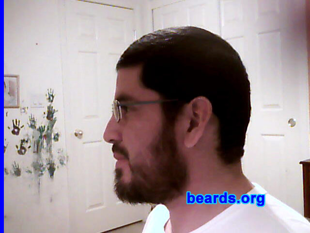 Gabriel
Bearded since: 2003, off and on. I am an experimental beard grower.

Comments:
For me, it's a religious devotional act as well as an act of beautification and a way of going against the grain of what most people in society find desirable about a man.

How do I feel about my beard? I'm content with it. I realized that if I just stopped trying to grow the "perfect" beard, and started to just grow one that has the basic shape that I like, even though it's rough around the edges, then I should be able to pull it off...successfully growing a beard that is.
Keywords: full_beard