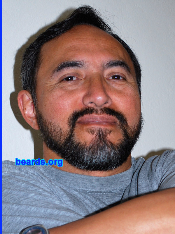 Janaka
Bearded since: 1985. I am an occasional or seasonal beard grower.

Comments:
I have been growing a beard every winter since I was in my twenties. This year I waited until February 2011 to start my winter look. I found this website in mid-March and people's comments encouraged me to grow a fuller beard this time, which I have never done before. These pics show a trimmed beard after eight weeks.

How do I feel about my beard? Considering I am Chinese-Mexican, this beard is as full as it can get. Interestingly, my dad was from China so the beard I inherited is from him rather than from my Mexican side. He never grew a beard but, as a child, I remember him with a three-day stubble that could have developed into a pattern pretty much like mine. I wish it were fuller on my cheeks, but I am happy with what I've got.
Keywords: full_beard