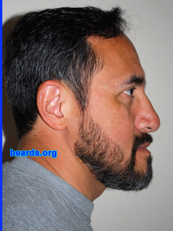 Janaka
Bearded since: 1985. I am an occasional or seasonal beard grower.

Comments:
I have been growing a beard every winter since I was in my twenties. This year I waited until February 2011 to start my winter look. I found this website in mid-March and people's comments encouraged me to grow a fuller beard this time, which I have never done before. These pics show a trimmed beard after eight weeks.

How do I feel about my beard? Considering I am Chinese-Mexican, this beard is as full as it can get. Interestingly, my dad was from China so the beard I inherited is from him rather than from my Mexican side. He never grew a beard but, as a child, I remember him with a three-day stubble that could have developed into a pattern pretty much like mine. I wish it were fuller on my cheeks, but I am happy with what I've got.
Keywords: full_beard