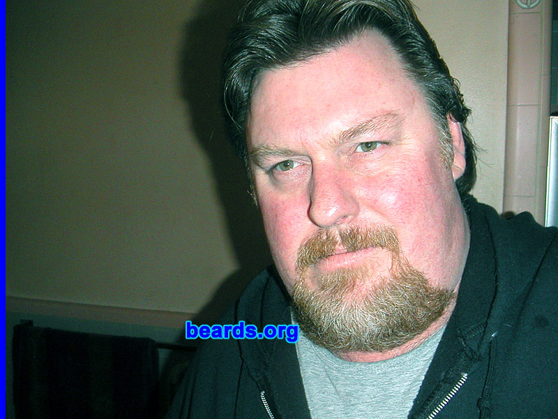 Kevin F.
Bearded since: 1985.  I am a dedicated, permanent beard grower.

Comments:
I grew my beard because I always liked to have a full beard or a variation of beard and goatee. I always thought it went well with my Harley lifestyle.

How do I feel about my beard?  As I approach my mid forties, it's getting really gray.This is taking a little while to get used to.
Keywords: goatee_mustache