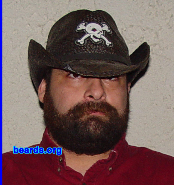 Merk H.
Bearded since: 1987.  I am an occasional or seasonal beard grower.

Comments:
I grow my beard out because it is AWESOME! I change my facial hair about once per quarter from full beard to goatee to mustache and then back to full beard. Sometimes I will stay with one type for longer than three months, in which case I will trim my beard to a #2. I usually don't trim my mustache, which is why it gets a little sloppy.

How do I feel about my beard? I named my beard "Rambo".
Keywords: full_beard