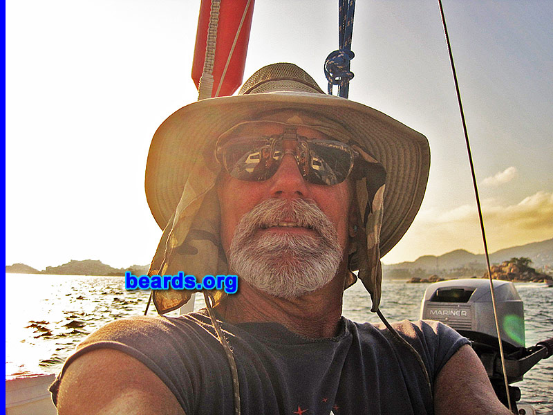 Mickey W.
Bearded since: 2012. I am a dedicated, permanent beard grower.

Comments:
Why did I grow my beard? It grows so fast...also protects my face while sailing.

How do I feel about my beard? It makes me feel strong.
Keywords: goatee_mustache