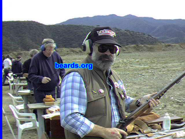 Raul Blacksten
Bearded since: 1974. I am a dedicated, permanent beard grower.

Comments:
My 5 o'clock shadow used to show up around noon and when I was twelve, my junior high school principal threatened to shave me. I have a curly, thick beard and I was tired of ingrown whiskers. So after college, when I was going to spend the summer of '74 in a hot and humid location, I decided to not shave. I haven't shaved since.

How do I feel about my beard? I can't imagine being without it. I am a pilot and have not flown over 18,000 feet or gone into the altitude chamber (simulates flights over 18,000 feet) because it would mean having to shave. I figure it also helps hide the ugly face beneath.
Keywords: full_beard