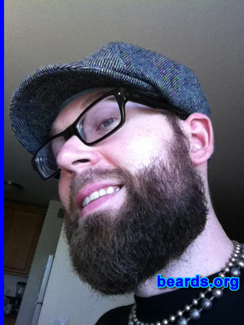 Ryan N.
Bearded since: 2009. I am an experimental beard grower.

Comments:
Why did I grow my beard? I love the feeling of having a beard, both physically and mentally. It's just outright manly. I get bored sometimes with how I look. So I love changing the way my facial hair looks. Usually, I'll just keep a fu manchu mustache, combined with a long goatee. But occasionally, I'll just let it all grow out. I love the feeling of growing a beard. You feel just that much manlier. Plus, shaving is a real hassle. My wife would constantly tell me to clean up the mess I left in the bathroom after shaving. Also, I just read that growing a beard helps keep your skin younger and healthier; especially with blocking it from direct sunlight, which there is plenty of here in SoCal.

How do I feel about my beard? I love it!  I'm mostly satisfied with my beard. I wish it were thicker, and softer, but I'm not going to complain. Some men can't even grow a beard, which is sad for any guy. 
Keywords: full_beard