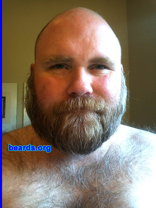 Thomas B.
Bearded since: 1995. I am a dedicated, permanent beard grower.

Comments:
I first started growing facial hair when I started working in an office in 1990 (I was nineteen) and wanted to look more mature. Over the years since then, I can only think of a few times when I've been without facial hair. I also grow out my beard at Christmas to play Santa at various charity and work functions.

How do I feel about my beard? Having facial hair in general for me is a natural state of being. I typically have a beard, but have been known to trim down in hot climates. If I do trim down it usually is back to a full beard within a few weeks.
Keywords: full_beard