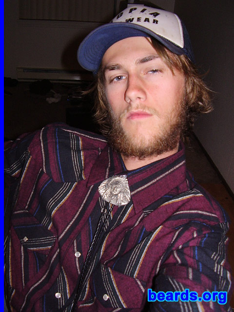Travis
Bearded since: 2005. I am an experimental beard grower.

Comments:
I grew my beard to liberate myself. I wanted to know what it truly meant to be free. How do I feel about my beard? I love it. It is soft and comfortable. It's fun to play with, and it keeps them heart breakers away.
Keywords: full_beard