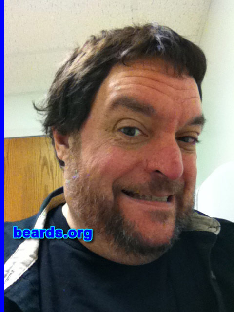 John A.
Bearded since: 2013. I am an experimental beard grower.

Comments:
Why did I grow my beard? Wanted to do something different. This is it at three weeks.

How do I feel about my beard? So far I like it and plan on keeping it. I am not all that thrilled about the front part of my chin not growing anything.
Keywords: full_beard