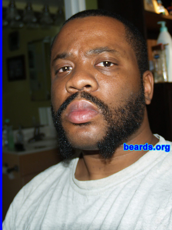 Michael M.
Bearded since: 1997. I am an occasional or seasonal beard grower.

Comments:
I started growing my beard when I found out my wife was pregnant with twins. I told myself I would grow it until they were born. My job wasn't going for it (assistant principal) but I was able to keep the goatee portion. For some reason the middle section directly under my chin wasn't growing as long as the sides of the goatee. When I went on paternity leave I decided to go with the friendly mutton chops look.

How do I feel about my beard? I love it.  My wife hates it. My friends get a kick out of it.  They say it looks like a wolverine type thing.
Keywords: mutton_chops
