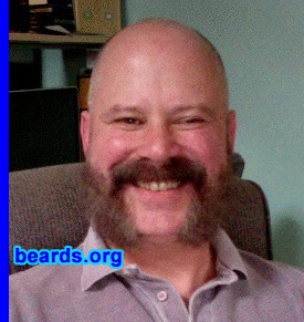 Michael S.
Bearded since: 1985.  I am a dedicated, permanent beard grower.

Comments:
I grew my beard because it just looks good.

How do I feel about my beard? I love beards. I wish mine were a bit "straighter" and not as wiry, but it is a very good beard. Oh, and the friendly chops are new for a Steampunk weekend. Usually I have a full beard.
Keywords: full_beard