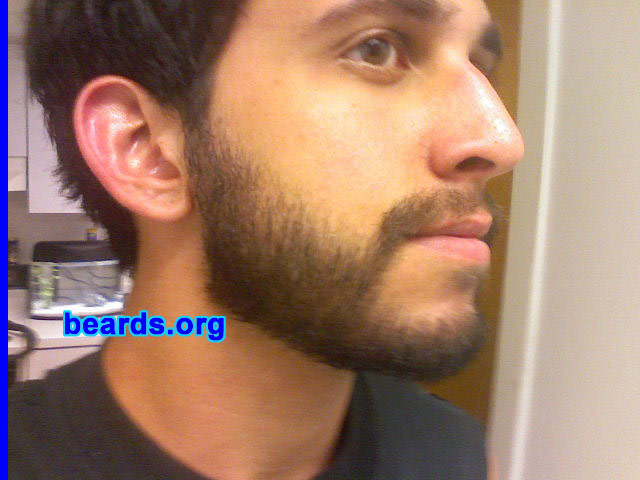Alex
Bearded since: 2007.  I am an experimental beard grower.

Comments:
I grew my beard for a few reasons. I was sick of shaving and just wanted to see what it would be like. I then committed to a month-long contest and have been bearded for over three weeks now and loving it.

How do I feel about my beard?  I feel great about it. In our society so many are altering their bodies and facial features so I figured the most honest thing I could do was to be true to myself and grow a beard.
Keywords: full_beard