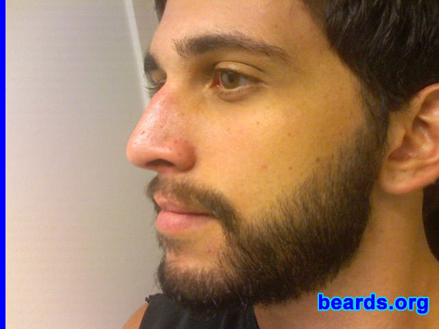 Alex
Bearded since: 2007.  I am an experimental beard grower.

Comments:
I grew my beard for a few reasons. I was sick of shaving and just wanted to see what it would be like. I then committed to a month-long contest and have been bearded for over three weeks now and loving it.

How do I feel about my beard?  I feel great about it. In our society so many are altering their bodies and facial features so I figured the most honest thing I could do was to be true to myself and grow a beard.
Keywords: full_beard