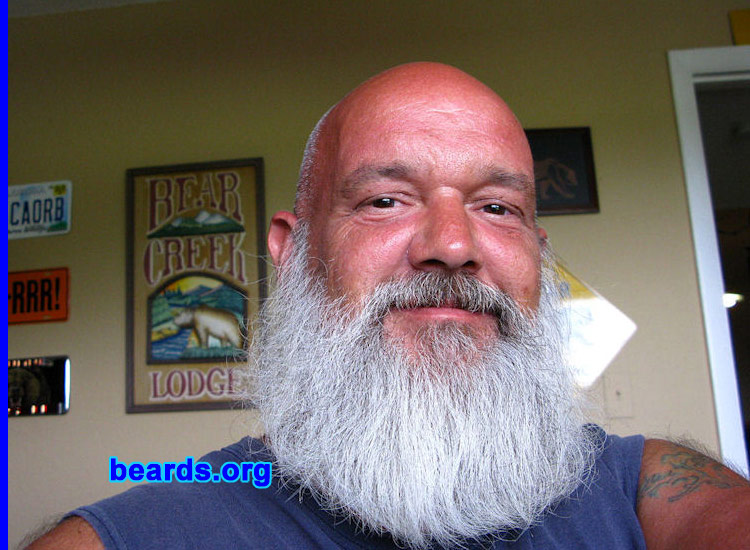 Gary Norman
Bearded since: 1991.  I am a dedicated, permanent beard grower.

Comments:
In the first place, I grew the beard because I hated to shave...then I fell in love with my beard and I've worn a beard on and off over the years...mostly on!

How do I feel about my beard?  It has a few thin spots, but I love it!
Keywords: full_beard