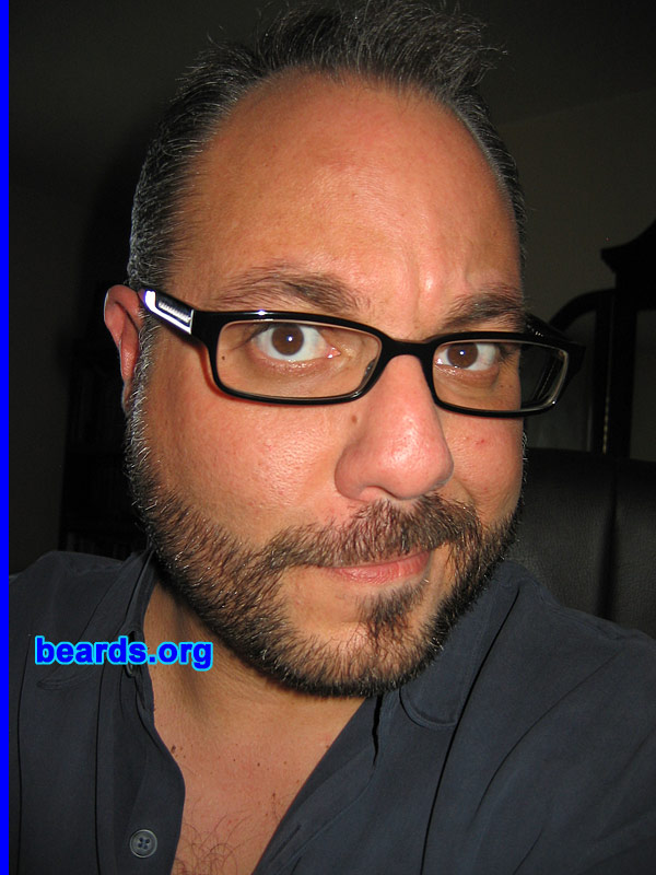 Javier L.
Bearded since: 1989.  I am an occasional or seasonal beard grower.

Comments:
I grew my beard because I was initially inspired by the character of Commander William Riker, portrayed by actor Jonathan Frakes, on "Star Trek: The Next Generation".

How do I feel about my beard? It suits my character. I'm an academic at heart and by trade. So, my beard goes nicely with my glasses and the shelves upon shelves of books I'm constantly surrounded by.
Keywords: full_beard