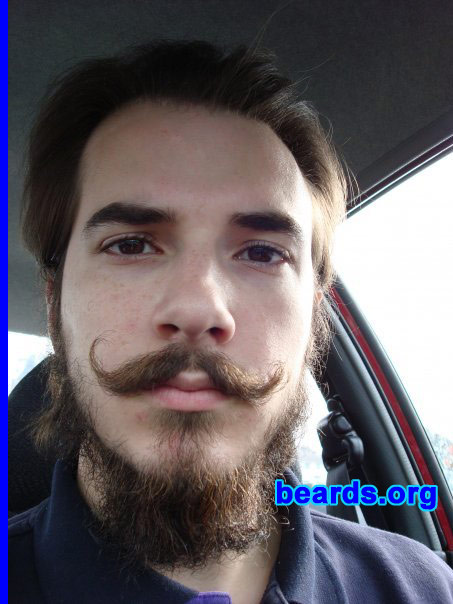 Jonathan D.
Bearded since: 2009.  I am an occasional or seasonal beard grower.

Comments:
The first time I grew what I considered to be a "long" beard, long for me that is, was due to a Judeo/Christian religious vow I made. My beard and naturally curled mustache got such wonderfully different comments and stares that I decided I really liked it. Unfortunately the nature of the vow required me to shave it at the end. I actually have a video of the shaving of my beard/mustache/head hair. 

Recently, I decided that I want the beard back again, this time without the vow so I have no need to shave it at the one year mark. 

How do I feel about my beard? For the most part I love my beard. It makes me feel distinguished and manly, rugged. I know that my girlfriend finds it intrusive, though.  And at times, I see the inconvenience of having a mustache that I keep food off of and constantly keep clean like head hair, in the shower. If I could grow beard in a day, as tempting as that idea would be, I don't think I'd like it as much. Knowing that it took time and a lot of personal grooming and hygiene to create my perfect beard, means a lot to me, especially when I actually get the occasional compliment on the size of my beard when it is large.
Keywords: full_beard