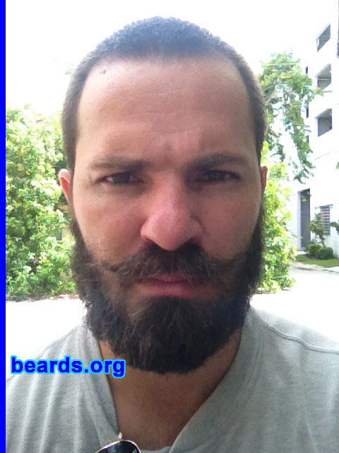 Ronald
Bearded since: 2011. I am a dedicated, permanent beard grower.

Comments:
I grew my beard this time because, in my line of work (Repo man for the power company), it helps a lot with situations with people wanting to challenge me or fight.  They think twice when they see the beard. LOL.

How do I feel about my beard? I feel my beard adds a dimension to my character.  It commands respect with no effort and, as I say, "A guy with a beard doesn't [mess] around". But if you have a beard, the best look to it is a serious facial expression. In short, I enjoy it.
Keywords: full_beard
