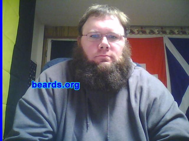 Justin
Bearded since: 1998.  I am a dedicated, permanent beard grower.

Comments:
I grew my beard because I am lazy and believe all men should grow them (to the best of their ability).

How do I feel about my beard?  I love it...  I wish more jobs would be okay with it so I would not have to trim it.
Keywords: chin_curtain