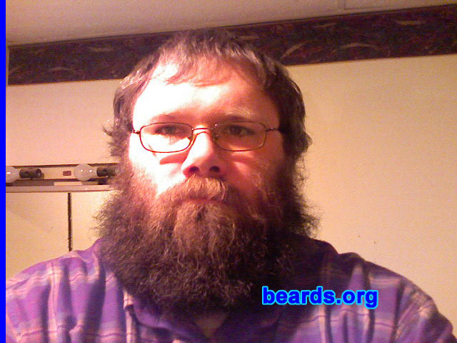 Justin
Bearded since: 1998.  I am a dedicated, permanent beard grower.

Comments:
I grew my beard because I am lazy and believe all men should grow them (to the best of their ability).

How do I feel about my beard?  I love it...  I wish more jobs would be okay with it so I would not have to trim it.
Keywords: full_beard