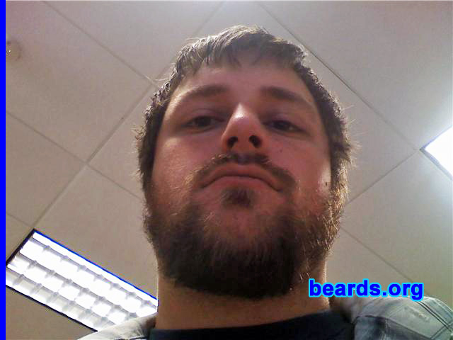 Hoss
Bearded since: 2003.  I am a dedicated, permanent beard grower.

Comments:
I've had a chin strap since when I was right out of high school. I have had a soul patch since I was fourteen. I've kept my beard short and trimmed my whole life, but over the last month or so, I've decided I want to try my hand at growing a full beard. I really have no "reason" to grow it, other than I want to try it and see how it looks.

How do I feel about my beard?   It's coming along slowly but surely. I wish it were thicker, but I suppose that comes with time. I enjoy the novelty of growing it and would very much like to have a huge, glorious, manly beard and one day compete.
Keywords: full_beard