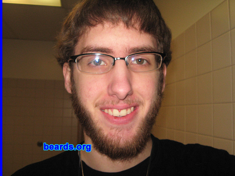Casey C.
Bearded since: 2009.  I am a dedicated, permanent beard grower.

Comments:
I grew my beard because:
I've always wanted one. 
I look good with one. 
My fiance loves it. 
I'm just about the only one in my school that can grow one. 
It makes me stand out.

How do I feel about my beard?  Some areas aren't great.  But overall, it isn't half bad.
Keywords: full_beard