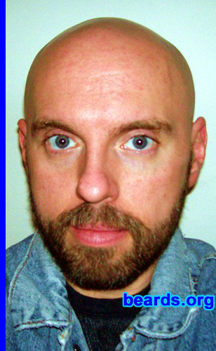 JJ
Bearded since: 2005.  I am an experimental beard grower.

Comments:
I'm trying a full, bushy beard with my shaved head look.

It's filling in more and more.
Keywords: full_beard