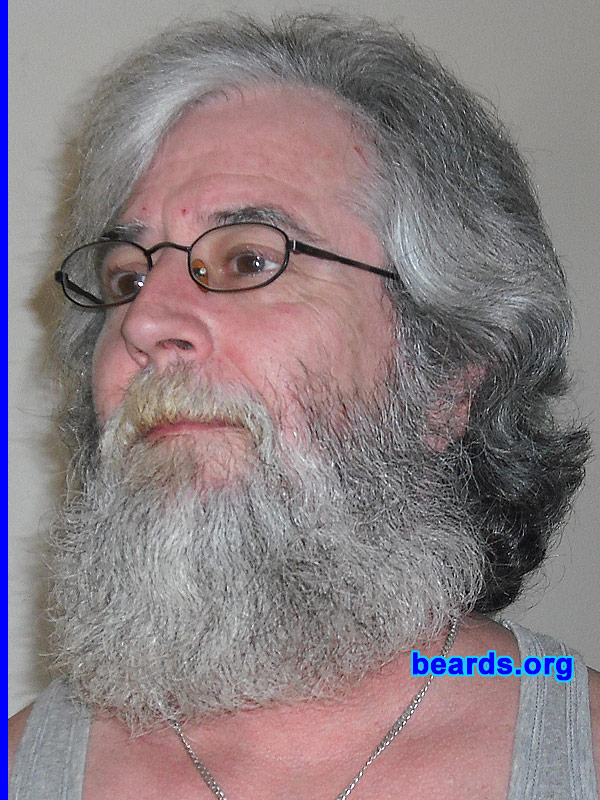 John M.
Bearded since: 1980.  I am a dedicated, permanent beard grower.

Comments:
I grew my beard  because I could and I don't like to shave. People have told me I look better with one than without.

How do I feel about my beard?  I love it. I have always kept it short, but shaved it off in April of 2009. What a mistake that was. I haven't shaved since then and plan on letting it continue to grow.
Keywords: full_beard