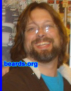 Jason M.
Bearded since: 1992. I am a dedicated, permanent beard grower.

Comments:
Growing up in the 1970s, all cool guys (including Jesus) had long hair and beards. I couldn't wait to flip my hair and grow a beard.

How do I feel about my beard? I love it. I occasionally shave, just to see what is underneath the beard, and I usually regret it. Last time I did it, my daughter made me swear never to shave my beard off again.
Keywords: goatee_mustache