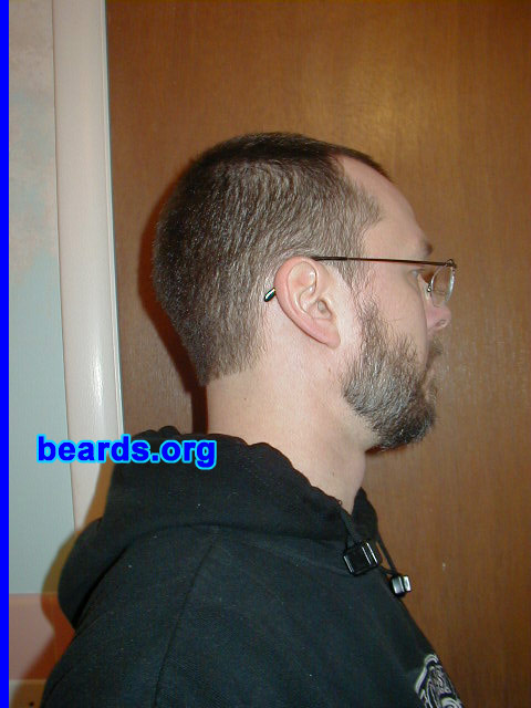 Doug
Bearded since: 1995.  I am a dedicated, permanent beard grower.

Comments:
I grew my beard originally because I wanted to look older and stylish. I've always wanted a beard, but growing a full beard didn't look so good. I started with the mustache and goatee and had that for about 7 years. Then, over a vacation, I let the rest grow in. I had a very short beard and mostly just a chin strap. Gradually since then I've been letting the whole beard grow in.

It makes me feel masculine and confident. Most men I know don't let their beards grow. They shave them off after a few weeks or keep them really short. I'd like mine to be thicker, but I have sparse growing hairs and there's not much I can do about that. My wife likes the gray that I'm getting, so that's definitely a plus!
Keywords: full_beard