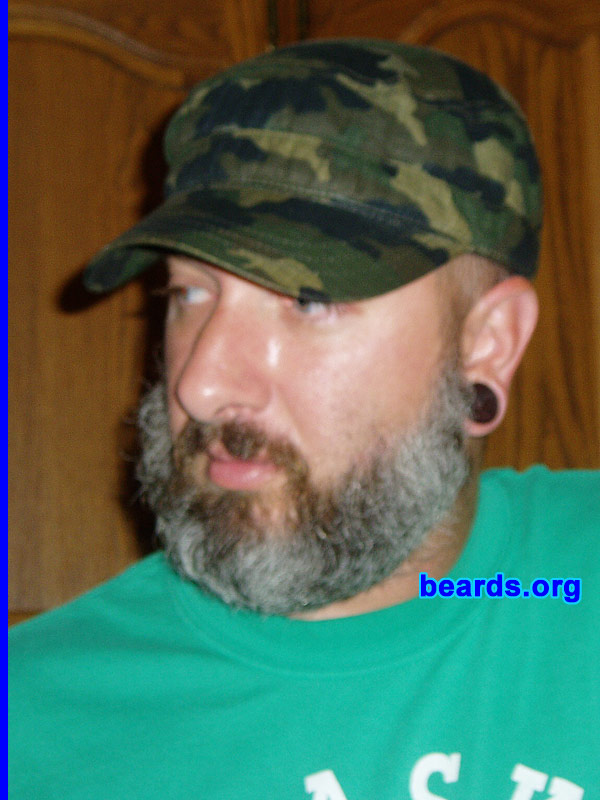 Jason Renn
Bearded since: 2005.  I am a dedicated, permanent beard grower.

Comments:
I grew my beard because I'm lazy...  My beard started as a goatee and mutton chops about ten years ago, but slowly evolved into a full beard about two or three years ago. 

How do I feel about my beard?  I pretty much think my beard rules...  On those few occasions when my wife asks me nicely to trim it down, I feel like I'm missing an important part of myself. I really can't imagine being clean shaven anymore.
Keywords: full_beard