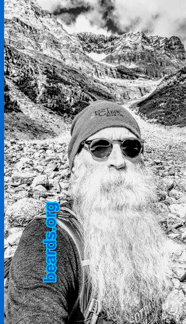 Neal
Bearded since: 2015. I am an experimental beard grower.

Comments:
Why did I grow my beard? I woke up one morning and just decided not to shave. One day became two, then a week, and now it's been almost three months.

How do I feel about my beard? I've had a mustache for over forty years. The beard started just as a whim but now it's a keeper.

The beard in this photo is at 2.5 years.
Keywords: full_beard