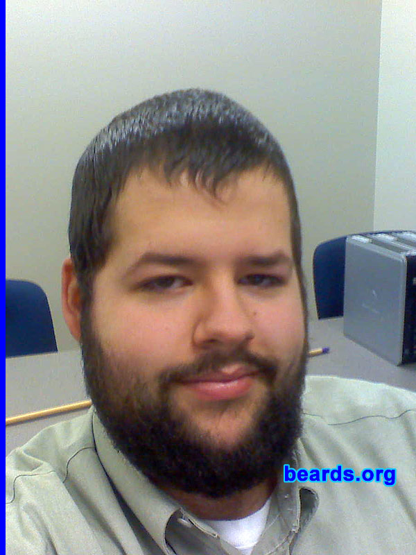 Ryan M.
Bearded since: 2008.  I am a dedicated, permanent beard grower.

Comments:
I grew my beard because I got tired of shaving. Sure people call me names, including Amish (in fact, while at the Zoo earlier this year, an Amish man actually stopped me and asked why I was growing a beard, I asked why not... of course it was interesting as here we both are, dressed fairly similar, him with his black hat, I with my straw hat, similar length beards... I just had lip hair to go with mine, and mine was more wild). I've buckled a few times and cut it down to an inch, but my goal is to get it down to my sternum.

How do I feel about my beard? If I could survive through the current phase, where tufts will start to stick out... then I'd be happy. Ideally I want it to my sternum, but once the hairs get to about two inches in length... I'll get random tufts that hang down where as everything else will be matted down and it makes me look like a bum.
Keywords: full_beard