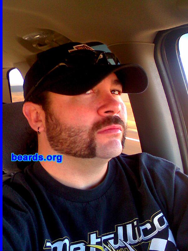 Dustin M.
Bearded since: 1998.  I am a dedicated, permanent beard grower.

Comments:
I grew my beard because of razor burn.  I look better with it.  It's just who I am.  I feel better with the beard.

How do I feel about my beard?  Love it.  It's just a part of who I am.
Keywords: mutton_chops