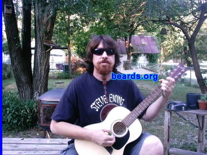 Erik C.
Bearded since: 1995. I am a dedicated, permanent beard grower.

Comments:
Why did I grow my beard? Not sure, but it just felt right, or mabye it was the movie mountain men.

How do I feel about my beard? I feel great about my beard.  It keeps my face warm in the winter and women like to pull on it and play with it. I do get some funny looks when I have the ruberbands in it, but I also get some cool compliments.
Keywords: goatee_mustache