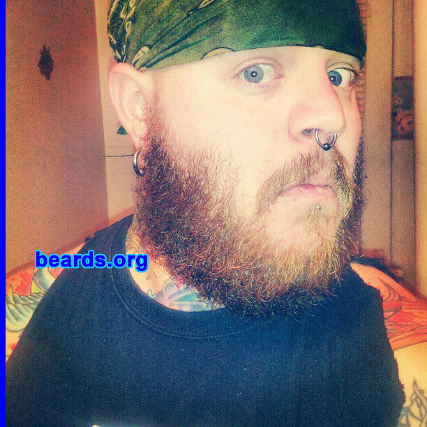 Ronnie J.
Bearded since: 2004. I am a dedicated, permanent beard grower.

Comments:
I always have some form of facial hair, usually a goatee. But now I've decided it is time to let the man come out and grow the beard to its full potential.

How do I feel about my beard? I love my beard. It is full and thick and loves to be played with and complimented.
Keywords: full_beard