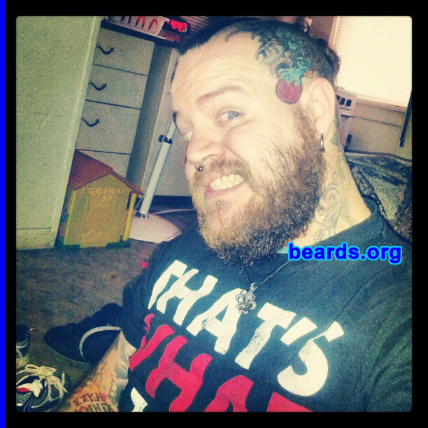 Ronnie J.
Bearded since: 2004. I am a dedicated, permanent beard grower.

Comments:
I always have some form of facial hair, usually a goatee. But now I've decided it is time to let the man come out and grow the beard to its full potential.

How do I feel about my beard? I love my beard. It is full and thick and loves to be played with and complimented.
Keywords: full_beard