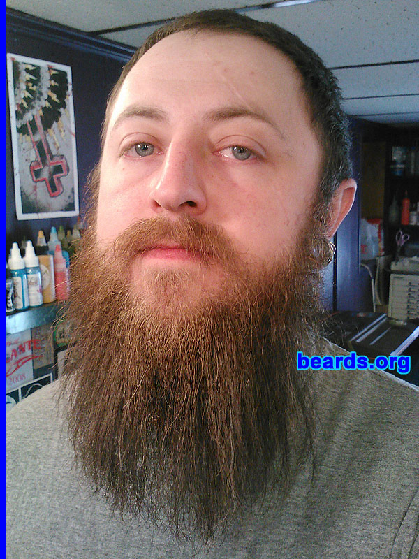 Joshua Todd K.
Bearded since: 2011. I am a dedicated, permanent beard grower.

Comments:
I grew my beard for many purposes. Mainly I feel that having a beard lets people know that if they need something done the right way or need some one in charge that they can come to me to get the job done.

My beard was originally cast as Bane in the new Dark Knight movie, but was later pulled from the cast as the producer believed my beard versus Batman was an unfair fight as Batman would lose.  So they cast a weaker actor.

It also helps in fending off dragons, orcs, and even the Medusa.

How do I feel about my beard? I love my beard very much. Every day I wash and condition it, along with giving it positive reinforcement to grow. It enjoys pillow talk just as much as it enjoys going into battle with my fellow vikings.

My beard's turn-ons include but are not limited to: Viking metal, stoner rock, well-executed tattoos, axes and various medieval weapons and torture devices, fallen comrades residing in Valhalla, and rare steak off the bone.

My beard's turn-offs include: Dubstep, razors, Adele, Nicki Minaj, Skyrim, soup and wings with sauce, contraceptives (my beard is enough protection), tears and the elusive duck face.

Most importantly, my beard makes me happy. It is something I love very much and that is the most important thing.
Keywords: full_beard