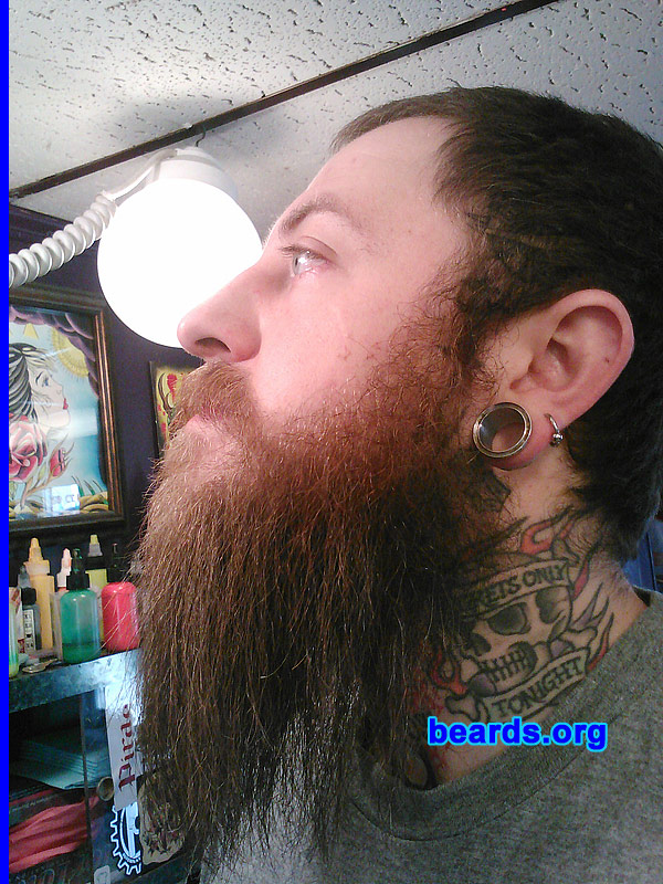 Joshua Todd K.
Bearded since: 2011. I am a dedicated, permanent beard grower.

Comments:
I grew my beard for many purposes. Mainly I feel that having a beard lets people know that if they need something done the right way or need some one in charge that they can come to me to get the job done.

My beard was originally cast as Bane in the new Dark Knight movie, but was later pulled from the cast as the producer believed my beard versus Batman was an unfair fight as Batman would lose.  So they cast a weaker actor.

It also helps in fending off dragons, orcs, and even the Medusa.

How do I feel about my beard? I love my beard very much. Every day I wash and condition it, along with giving it positive reinforcement to grow. It enjoys pillow talk just as much as it enjoys going into battle with my fellow vikings.

My beard's turn-ons include but are not limited to: Viking metal, stoner rock, well-executed tattoos, axes and various medieval weapons and torture devices, fallen comrades residing in Valhalla, and rare steak off the bone.

My beard's turn-offs include: Dubstep, razors, Adele, Nicki Minaj, Skyrim, soup and wings with sauce, contraceptives (my beard is enough protection), tears and the elusive duck face.

Most importantly, my beard makes me happy. It is something I love very much and that is the most important thing.
Keywords: full_beard