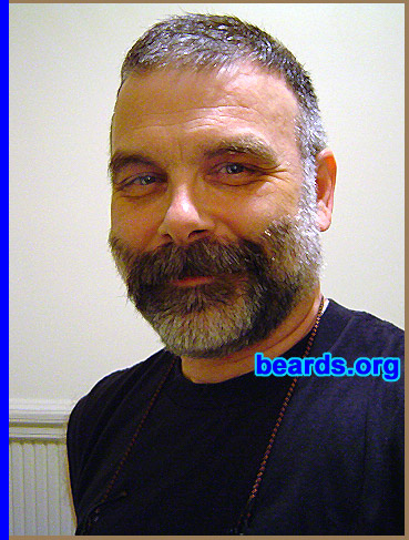 Michael
Bearded since: 1973. I am a dedicated, permanent beard grower.

Comments:
I have been shaving since I was 12, and grew my first beard when I was 16. I would have kept it, but the principal of the school I was attending said that if I didn't shave it off, I wouldn't graduate. I had no choice, but soon after graduation, I grew it back. Four inches is the longest I let it grow and it was surprisingly wavy and would get a red cast to it during the summer. As I get older, I prefer to have it relatively short. My beard is an integral part of my self image. I truly enjoy having it. 

[b]Also be sure to see [url=http://www.beards.org/beard03.html]Michael's extraordinary beard history[/url][/b].
Keywords: full_beard