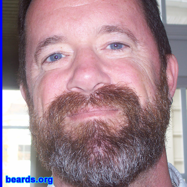 Bob J.
Bearded since: 1974.  I am a dedicated, permanent beard grower.

Comments:
When I was a teenager, I was one of three guys in my high school who could grow a decent beard. I've always liked the look and low maintenance, plus it's somewhat of a small fraternity.

It's always been a slightly different color than my head hair, more red. Now it's getting a bit gray around the muzzle, and I figure in about five years it's going to be complete. My beard (except the first attempt) has always been good and full, no matter how long I let it get. My wife will complain on the rare occasions I shave down to a goatee or moustache, so I usually grow it right back.
Keywords: full_beard
