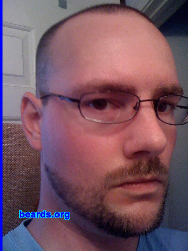Jim R.
Bearded since: 2006.  I am a dedicated, permanent beard grower.

Comments:
When exiting the Army, there is an untold tradition to grow a beard. I grew a short, trimmed, full beard; and LOVED it.   Since then it has become part of me. 

How do I feel about my beard?  While doing some beard research (or beardsearch), I discovered that there was a style of beard called the "Reed".  Intrigued, since that is my last name, I decided to look it up. The only thing I could find was this:

[b]Reed[/b] â€“ A beard with integrated mustache that is worn on the lower part of the chin and jaw area that tapers towards the ears without connecting sideburns.

I could not find a single picture! While searching, I came across your website and decided that I would submit one (or three).  I trimmed up the beard to what I thought fit the description and took a few pics with the cell phone.  Although this is not a "created" style by me, I would like to think that I am re-establishing it.  It would be awesome to see some others here post their own Reed Beards!
Keywords: goatee_mustache extended_goatee