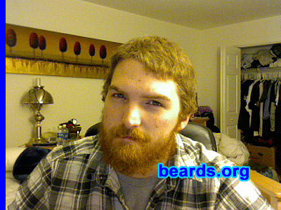 John M.
Bearded since: 2011. I am an experimental beard grower.

Comments:
I decided to start growing my beard because I just recently separated from the Air Force. In the military, facial hair is frowned upon and strict regulations are imposed to keep men from growing a beard. I made a promise to myself that when I got out of the military, I would grow the beard from day one. It's almost as if it's a symbol of my freedom and a reminder that I can grow my facial hair any d@mn way I please.

How do I feel about my beard? I love it! I've picked up the habit of stroking the beard when I'm engaged in stimulating conversation.  And it feels good to know that not that many of my friends are as beard-capable as I am. I often get compliments on it (along with some rude comments). But the best part is knowing at the end of the day I'm doing what I want with my facial hair. While I DO love the beard, it does have some downsides. I often wish that my hair wasn't so wiry. It's rather curly, which is a different look than what I'm really going for. We'll see how it looks as the years go by though.
Keywords: full_beard