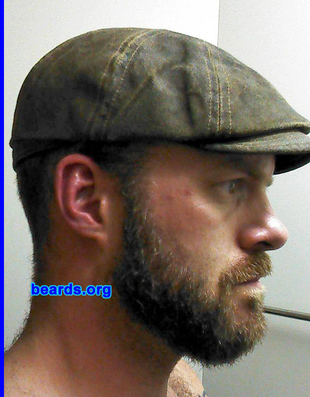Ben H.
Bearded since: 1997 (not continuously as my college was was a military-esque and we were required to be clean shaven, but up to and since after, yup).  I am a dedicated, permanent beard grower.

Comments:
I grew my beard because I have always liked them. Used to have dreams about having a full beard when I was a little kid. Since I was a sophomore in high school I have had huge mutton chops, huge friendly mutton chops, side burns, a six-inch goatee, several varieties of mustache (with my favorite being the military cut), a soul patch, a chin curtain, wolverine style sideburns (a half-razor-width gap), clean shaven, a trimmed full beard, a goatee and moustache, and finally a true full beard for the first time.

How do I feel about my beard? I like my beard. My wife loves my beard. If I could change anything, I would make it less coarse and more thick. Am very happy with how fast it grows. Fast as all get out.
Keywords: full_beard