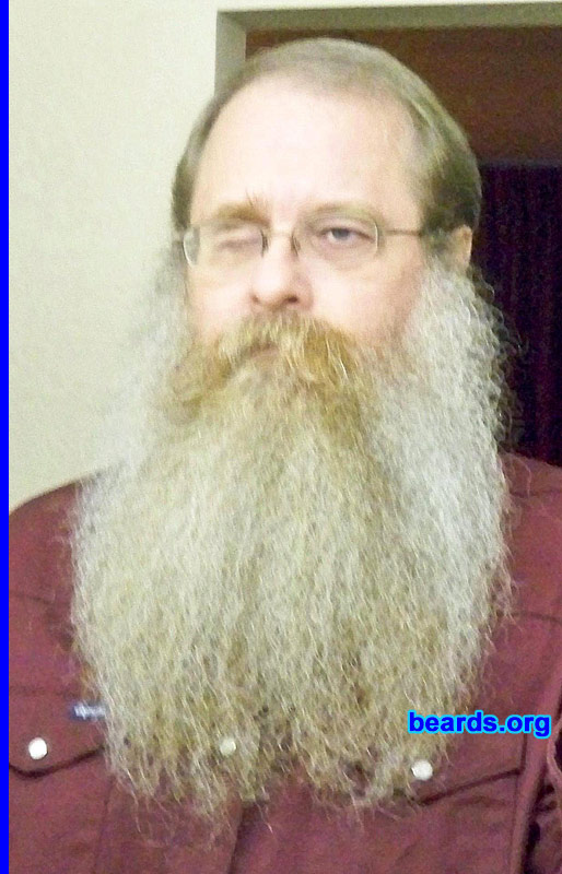 Aldon Olson
Bearded since: 1980. I am a dedicated, permanent beard grower.

Comments:
I grew my beard because I was, as a young child, inspired by a portrait of my great great grandfather who had a full beard.

How do I feel about my beard? I love my beard and have been "inspired" by the "masters" to never cut my beard again, not even a trim.

The above photo was taken in Oil City, PA where I took first place in "full beard natural".
Keywords: full_beard